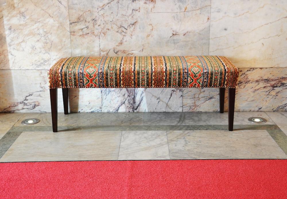 Hotel Diplomat Stockholm Exterior foto A bench in the lobby of the National Museum of the United States Army